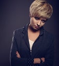 Beautiful cocky woman with short bob blond hairstyle in fas