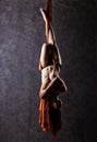 Beautiful dancer on aerial silk, graceful contortion, acrobat performs a trick on a ribbons Royalty Free Stock Photo