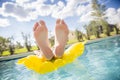 Beautiful Feet and toes floating in the swimming pool Royalty Free Stock Photo