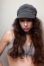 Beautiful female model in trendy cap