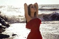 Beautiful girl with dark hair in elegant red dress Royalty Free Stock Photo