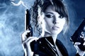 Beautiful girl holding gun Royalty Free Stock Photo