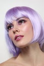 Beautiful girl with violet hair and fancy make-up Royalty Free Stock Photo