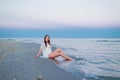 Beautiful girl in a white bathing suit and tunic Royalty Free Stock Photo