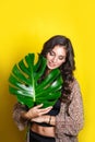 Beautiful indian woman in bikini with tropical plants. Beauty, fashion. Spa, healthcare. Tropical vacation. Royalty Free Stock Photo