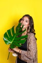 Beautiful indian woman in bikini with tropical plants. Beauty, fashion. Spa, healthcare. Tropical vacation. Royalty Free Stock Photo