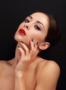 Beautiful makeup woman with bright red lips and black manicured nails Royalty Free Stock Photo