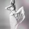 Beautiful and stylish pregnant woman.Blonde bride in wedding dress Royalty Free Stock Photo