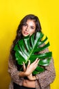 Beautiful indian woman in bikini with tropical plants. Beauty, fashion. Spa, healthcare. Tropical vacation. Royalty Free Stock Photo