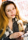 Beautiful woman drinking latte coffee