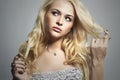 Beautiful woman.Flirt Blond Girl with Curly hair Royalty Free Stock Photo