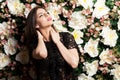 Beautiful woman on flower wallpaper background in studio ph Royalty Free Stock Photo