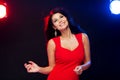 Beautiful woman in red dancing at nightclub Royalty Free Stock Photo