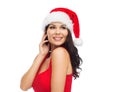 Beautiful woman in santa hat and red dress Royalty Free Stock Photo