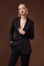 Beautiful sexy woman wear for meeting date business style suit jacket pants accessory fashion collection shoes model pose long