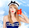 Beautiful woman wearing sailor striped dress