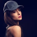 Beautiful young make-up model profile in blue baseball cap Royalty Free Stock Photo