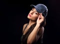 Beautiful young make-up model profile in blue baseball cap Royalty Free Stock Photo