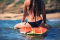 Beautiful young woman surfer girl waiting for a wave Royalty Free Stock Photo