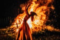 beautiful shamanic woman dancing by the fire. Royalty Free Stock Photo