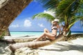 Beautiful shapely woman on tropical beach