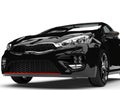 Beautiful shiny midnight black modern electric car - front view extreme closeup shot Royalty Free Stock Photo