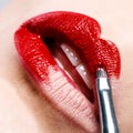 Beautiful shiny red lips as you paint brush Royalty Free Stock Photo