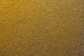 Gold glitter, abstract relief background of the holiday.