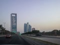 Beautiful shot of Abu Dhabi city street and Etihad towers at sunset