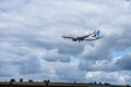 Beautiful shot of the AnadoluJet airplane cruising through the air Royalty Free Stock Photo