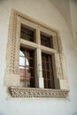 Beautiful shot of an ancient window in one of the buildings in Krakow, Poland