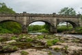 Beautiful shot of an antique bridge located in Yorkshire Dales National Park, England Royalty Free Stock Photo