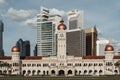 Beautiful shot of Bangunan Sultan Abdul Samad building with the background of modern skyscrapers Royalty Free Stock Photo