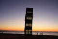 Beautiful shot of the Barceloneta beach in Spain on an orange sunset background Royalty Free Stock Photo