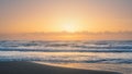Beautiful shot of a beach against ocean waves at South Padre Island, Texas at sunrise Royalty Free Stock Photo