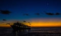 Beautiful shot of a big sailing yacht near Revillagigedo Islands during a sunrise in Mexico Royalty Free Stock Photo