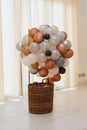 Beautiful shot of a birthday photo corner decoration made with balloons on a basket