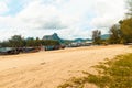 Beautiful shot of boats near the shore under a cloudy sky at daytime Royalty Free Stock Photo