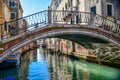 Beautiful shot of a bridge running over the canal in Venice, Italy Royalty Free Stock Photo