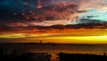 Beautiful shot of a bright vibrant colorful sunset sky over a sea Royalty Free Stock Photo