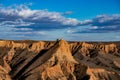 Beautiful shot of brown stone formations under a cloudy bright sky