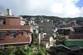 Beautiful shot of buildings in Jiufen, Taiwan with a cloudy sky in the background