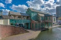 Beautiful shot of the Canal House in Birmingham close to a lake on a sunny day