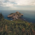 Beautiful shot of the chapel in San Juan de Gaztelugatxe in Spain with a cloudy background