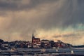 Beautiful shot of the city from Arendal, Norway with the clouds smearing down and raining