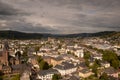 Beautiful shot of a cityscape on a stormy clouds background