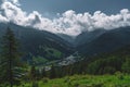 Beautiful shot of clouds on mountains on Parco Naturale Val Troncea, Italy