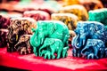 Beautiful shot of colorful figures of elephants for sale