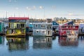 Beautiful shot of colorful vibrant floating homes and stores in the harbor in Victoria