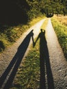 Beautiful shot of a couple\'s shadow holding each other hands - romantic concept